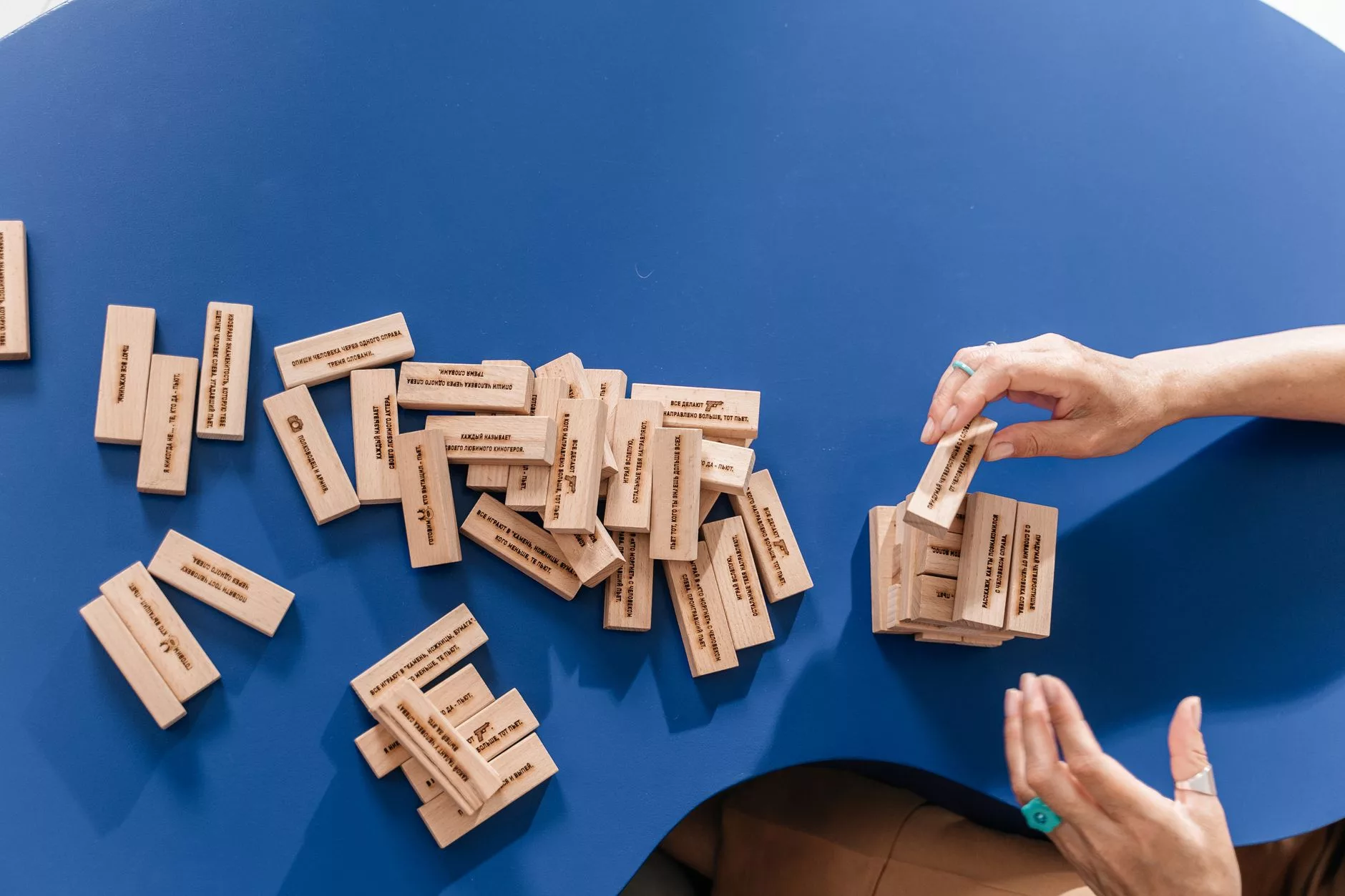 wooden blocks stacked together representing a layered financial strategy for family building
